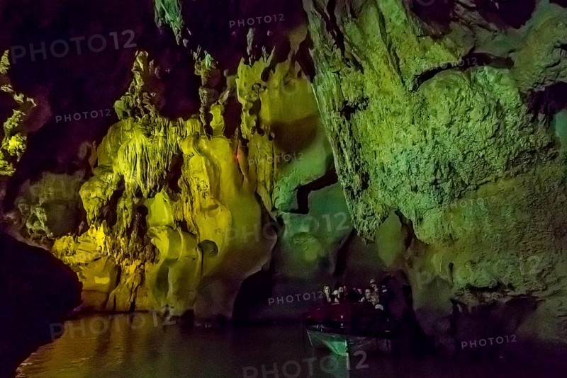 Tourists in a boat on the underground rivers in the caves of the Indios, Cueva del Indio, underground caves with a watercourse river accessible to tourists, Viñales, Cuba, Central America, Cuba, Caribbean