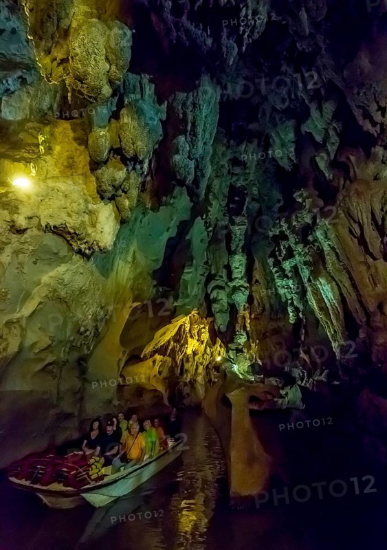 Tourists in a boat on the underground rivers in the caves of the Indios, Cueva del Indio, underground caves with a watercourse river accessible to tourists, Viñales, Cuba, Central America, Cuba, Caribbean