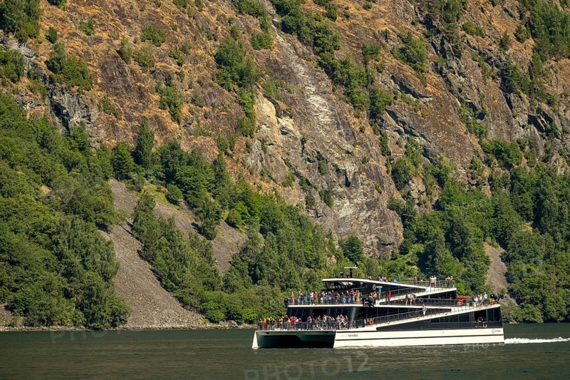 Catamaran, The Fjords, excursion boat, fjord, Nærøyfjorden, cliffs, trees, Styvi, Sogn og Fjordane, Norway, Scandinavia, Europe, NOR, travel, tourism, destination, sightseeing, sea voyage, Hurtigruten, Hurtigruten trip, tourism, Norwegian, Scandinavian, tourist, cruise, adventure trip, shipping, seafaring, waters, water, river, forest