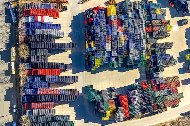 Aerial view, colourful coloured beverage crates of H. Leiter GmbH Leergutlogistik, shapes and colours, commercial area Gerlingen Zum Eichstruck, Hillmicke, Wenden, Sauerland, North Rhine-Westphalia, Germany, DE, Europe, commercial enterprises, commercial area, commercial property, commercial site, commercial use, industrial area, industrial site, aerial view, aerial photography, aerial photography, overview, bird's-eye view, overview