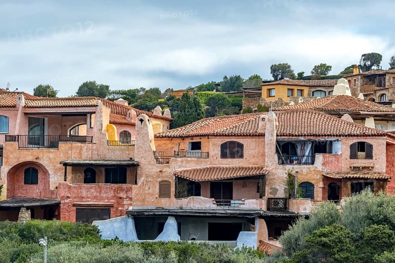 Sardinia, residential complex, worth seeing harbour town Porto Cervo, Arzachena, Europe, province Sassari, Italy, architecture, exterior view, inhabitants, relaxation, recreation, exclusivity, holiday resort, leisure, building, harbour town, coast, coastal town, luxurious, sea view, Porto Cervo, travel, sightseeing, summer, daylight, tourism, holiday, holiday destination, residential building, marina, blue sea, European, upscale, Italian, picturesque, Mediterranean, sunny