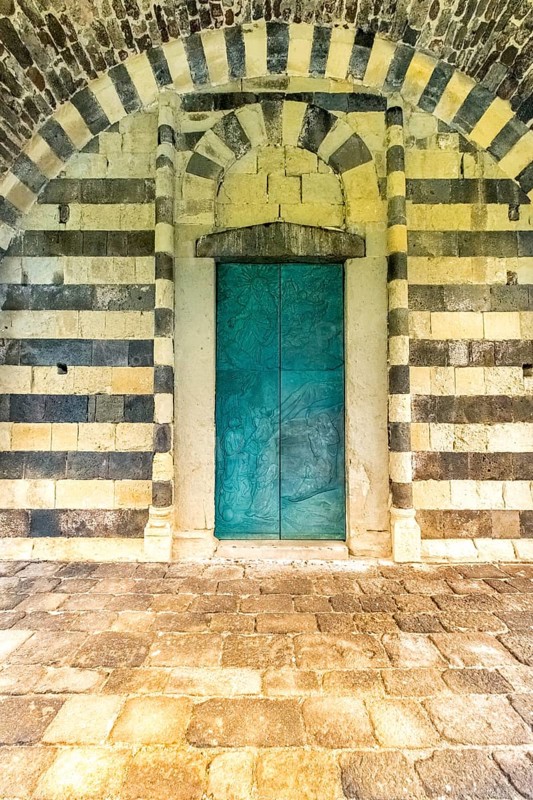 Sardinia, Santissima TrinitÃƒÆ'Ã'Â di Saccargia, Romanesque church with entrance door, Codrongianos, Europe, Province of Sassari, Italy, abbey church, place of worship, chiesa, religious community, place of worship, holy site, IT, church, parish, denomination, travel, destination, religion, religious site, sightseeing, tourism