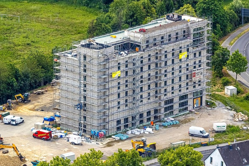 Aerial view, construction site with new hotel building on the corner of Flandersbacher Weg and Heiligenhauser Straße, Velbert, Ruhr area, North Rhine-Westphalia, Germany, architecture, construction work, construction workers, construction area, construction site, building plots, construction project, construction measure, construction phase, construction project, construction site, construction site vehicles, DE, corner plot, development, Europe, Flandersbacher Weg, progress, open space, catering, building, commercial enterprises, commercial area, commercial area, commercial property, commercial use, Heiligenhauser Straße, sky, hotel facilities, hotel industry, real estate, industrial location, infrastructure, construction, crane, aerial view, aerial photography, aerial photography, machines, modernisation, new construction, planning area, project, city, urban development, roads, overview, accommodation, urban, traffic, bird's-eye view, overview, VelbertMitte