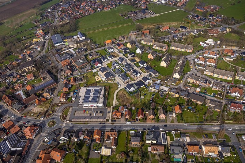 Aerial view, residential area local view district Dolberg, new REWE supermarket with solar roof, wind turbines, new roundabout Alleestraße and Uentroper Straße, new residential area Hases Wiese, catholic St. Lambertus church, Ahlen, Dolberg, Ruhr area, Germany, residential area, local view, district, REWE supermarket, solar roof, roundabout, Alleestraße, Uentroper Straße, new construction, Hases Wiese, catholic, St. Lambertus Church, architecture, urban planning, infrastructure, energy, sustainable, traffic, urbanisation, church, retail, solar system, renewable energy, district, streets, residential buildings, shops, community, landscape, development, environmentally friendly