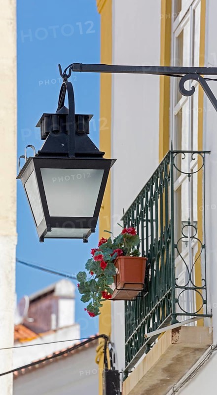 Alley in Evora with lanterns, Evora, Évora district, Portugal