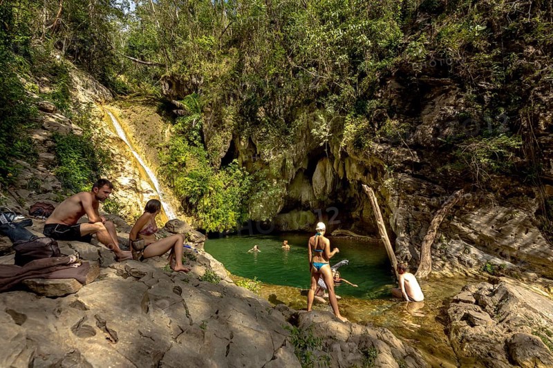 Small bathing lake in the Valle de los Ingenios with tourists, Trinidad, Cuba, Sancti Spíritus, Cuba, Villa Clara