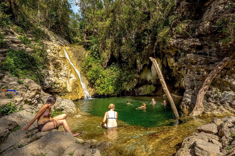 Small bathing lake in the Valle de los Ingenios with tourists, Trinidad, Cuba, Sancti Spíritus, Cuba, Villa Clara