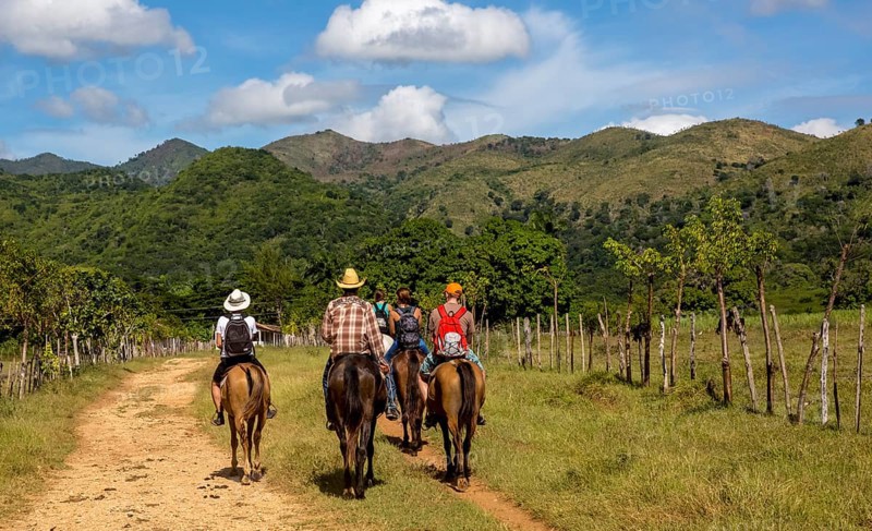 Tourists on horseback in the Valle de los Ingenios, Trinidad, Cuba, Sancti Spíritus, Cuba, Sancti Spíritus