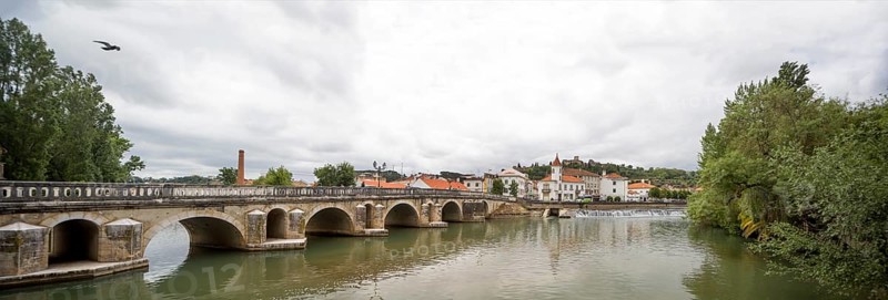 Renaissance bridge Ponte Velha over the Nabao near the old town of Tomar with the Convento de Cristo in the background, Tomar, Santarém district, Portugal, Europe, Santarém district, aerial view, birds-eyes view, Travel, Travel photography