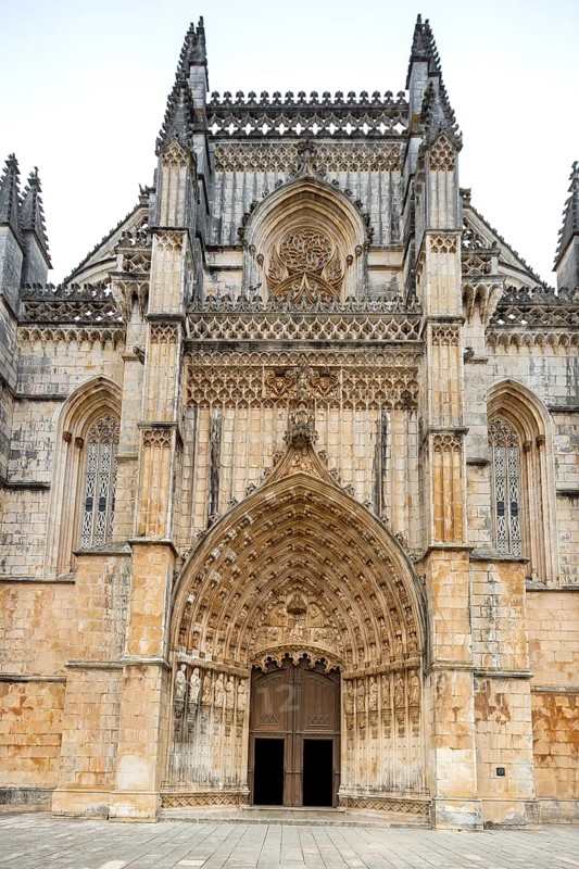 Monastery of Santa Maria da VitÃüria, UNESCO World Heritage Site, main portal with four-winged angels, monastery church of Batalha, Mosteiro da Batalha, Batalha, Leiria district, Portugal, Europe, aerial view, birds-eyes view, travel, travel photography