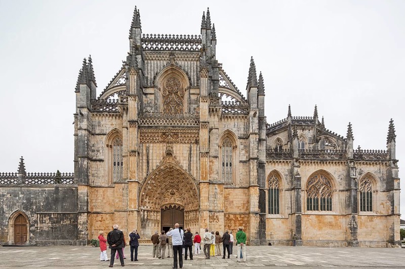 Monastery of Santa Maria da VitÃüria, UNESCO World Heritage Site, main portal with four-winged angels, monastery church of Batalha, Mosteiro da Batalha, Batalha, Leiria district, Portugal, Europe, aerial view, birds-eyes view, travel, travel photography