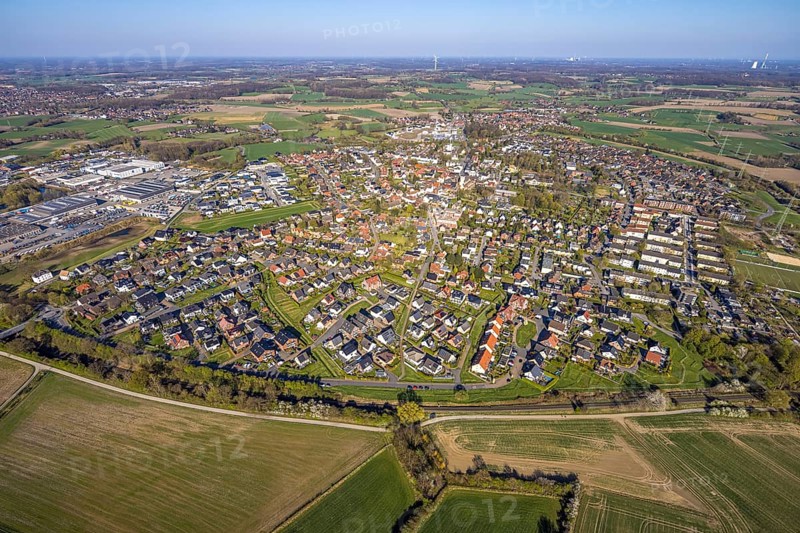 Aerial view, residential area, view of Bork district with distant view and blue sky, commercial area on the left, Selm, Münsterland, North Rhine-Westphalia, Germany, DE, Europe, property tax, real estate, aerial view, aerial photography, aerial photography, overview, bird's-eye view, residential area, living and living, residential area, residential quality, residential neighbourhood, housing estate, residential district, birds-eyes view, overview