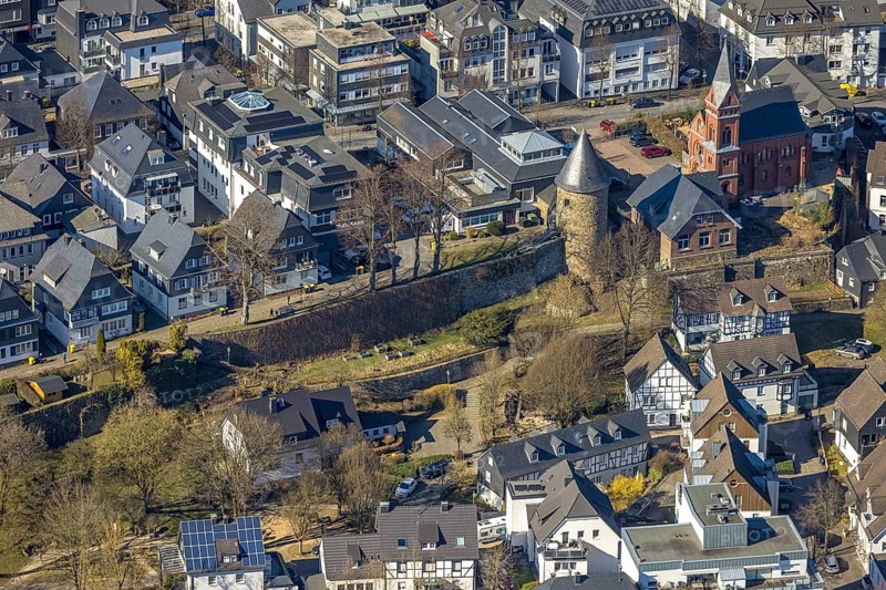 Aerial view, city wall with witch tower, evang. Church Olpe, OT Olpe youth centre and children's centre, residential area Frankfurter Straße, Olpe town, Olpe, Sauerland, North Rhine-Westphalia, Germany, place of worship, DE, Europe, religious community, place of worship, property tax, holy place, real estate, church, parish, denomination, aerial view, aerial photography, aerial photography, religion, religious site, tower, overview, bird's-eye view, watchtower, residential complex, living and life, residential area, quality of life, residential neighbourhood, housing estate, residential area, birds-eyes view, overview
