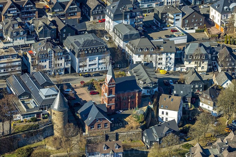 Aerial view, city wall with witch tower, evang. Church Olpe, OT Olpe youth centre and children's centre, residential area Frankfurter Straße, Olpe town, Olpe, Sauerland, North Rhine-Westphalia, Germany, place of worship, DE, Europe, religious community, place of worship, property tax, holy place, real estate, church, parish, denomination, aerial view, aerial photography, aerial photography, religion, religious site, tower, overview, bird's-eye view, watchtower, residential complex, living and life, residential area, quality of life, residential neighbourhood, housing estate, residential area, birds-eyes view, overview