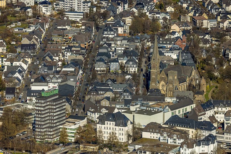 Aerial view, former Olpe railway station, left Olpe town hall, Altes Lyzeum (music school) and shopping centre, city and St. Martinus catholic church, roundabout Stellwerkstraße, Olpe city, Olpe, Sauerland, North Rhine-Westphalia, Germany, place of worship, authority, DE, Europe, religious community, place of worship, holy place, church, parish, denomination, aerial view, aerial photography, aerial photography, religion, religious site, overview, bird's eye view, birds-eyes view, overview