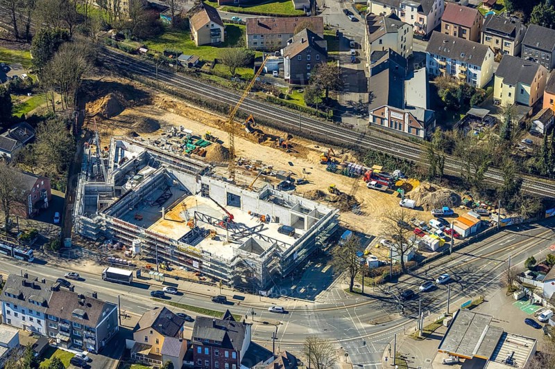 Aerial view, construction site with new building shopping centre Rewe supermarket, Crengeldanzstraße, Witten, Ruhr area, North Rhine-Westphalia, Germany, construction work, construction area, construction site, building plots, construction project, construction site, DE, shopping centre, shopping markets, shopping square, shopping centre, Europe, aerial view, aerial photography, aerial photography, local supply centre, new building, location, shopping centre, supermarket, overview, bird's eye view, bird's eye view, overview
