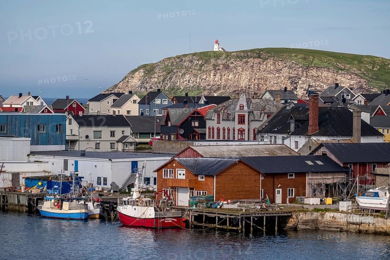Fishing boats in the harbour, Vardø fyr on the island of Hornøya, lighthouse, Vardø, Finnmark, Norway, Scandinavia, Europe, adventure travel, boats, tourism, Hurtigruten, Hurtigruten cruise, cruise, NOR, pile dwellings, travel, destination, ship, ships, sea voyage, sightseeing, tourism, Norwegian, Scandinavian, tourist