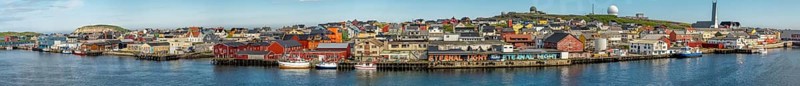 Panoramic photo harbour and town view, Street Art Eternal Light Eternal Night, observatory, church, Vardø, Finnmark, Norway, Scandinavia, Europe, adventure travel, place of worship, astronomy, tourism, religious community, place of worship, graffiti eternal light eternal night, Hurtigruten, Hurtigruten voyage, parish, denomination, cruise, NOR, panorama, panoramic view, panoramic photo, pile dwellings, travel, destination, religion, sea voyage, sightseeing, tourism, Vardø Church, Norwegian, Scandinavian, touristic