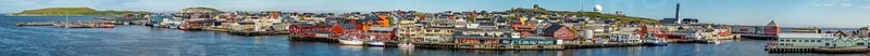 Panoramic photo harbour and town view, Street Art Eternal Light Eternal Night, observatory, church, Vardø, Finnmark, Norway, Scandinavia, Europe, adventure travel, place of worship, astronomy, tourism, religious community, place of worship, graffiti eternal light eternal night, Hurtigruten, Hurtigruten voyage, parish, denomination, cruise, NOR, panorama, panoramic view, panoramic photo, pile dwellings, travel, destination, religion, sea voyage, sightseeing, tourism, Vardø Church, Norwegian, Scandinavian, touristic