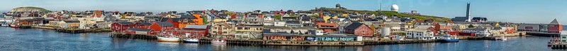 Panoramic photo harbour and town view, Street Art Eternal Light Eternal Night, observatory, church, Vardø, Finnmark, Norway, Scandinavia, Europe, adventure travel, place of worship, astronomy, tourism, religious community, place of worship, graffiti eternal light eternal night, Hurtigruten, Hurtigruten voyage, parish, denomination, cruise, NOR, panorama, panoramic view, panoramic photo, pile dwellings, travel, destination, religion, sea voyage, sightseeing, tourism, Vardø Church, Norwegian, Scandinavian, touristic