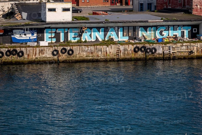 Street Art Eternal Light Eternal Night, in the harbour, Vardø, Finnmark, Norway, Scandinavia, Europe, adventure travel, tourism, graffiti eternal light eternal night, Hurtigruten, Hurtigruten voyage, cruise, NOR, travel, destination, sea voyage, sightseeing, tourism, Norwegian, Scandinavian, touristic