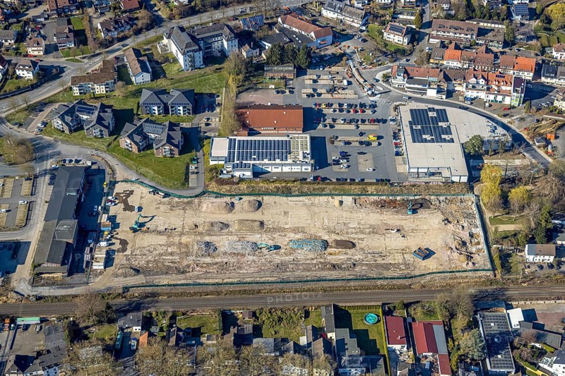 Aerial view, construction site Am Park, shopping centre with Aldi supermarket, Edeka Heder and Rossmann, Wickede, Soester Börde, North Rhine-Westphalia, Germany, construction work, construction area, building site, building plots, construction project, construction site, DE, shopping centre, shopping markets, shopping square, shopping centre, Europe, aerial view, aerial photography, aerial photography, local supply centre, new building, supermarket, overview, bird's eye view, Wickede (Ruhr), birds-eyes view, overview