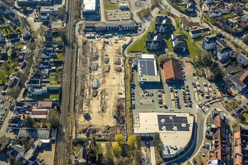 Aerial view, construction site Am Park, shopping centre with Aldi supermarket, Edeka Heder and Rossmann, Wickede, Soester Börde, North Rhine-Westphalia, Germany, construction work, construction area, building site, building plots, construction project, construction site, DE, shopping centre, shopping markets, shopping square, shopping centre, Europe, aerial view, aerial photography, aerial photography, local supply centre, new building, supermarket, overview, bird's eye view, Wickede (Ruhr), birds-eyes view, overview