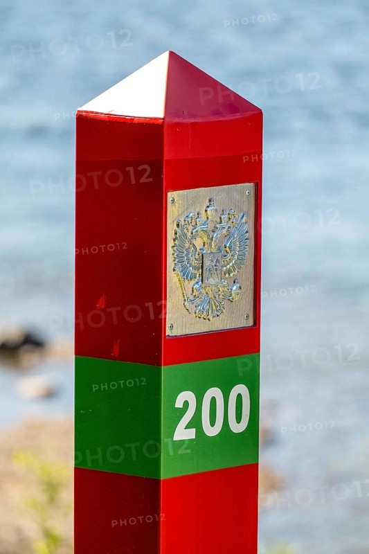 Border Norway-Russia, border posts, yellow border post Norway, red-green border post Russia, Kirkenes, Finnmark, Norway, Scandinavia, Europe, adventure travel, tourism, border markers, border stones, Hurtigruten, Hurtigruten voyage, cruise, land border, NOR, travel, travel destination, sea voyage, sightseeing, national border, tourism, Norwegian, Scandinavian, touristic