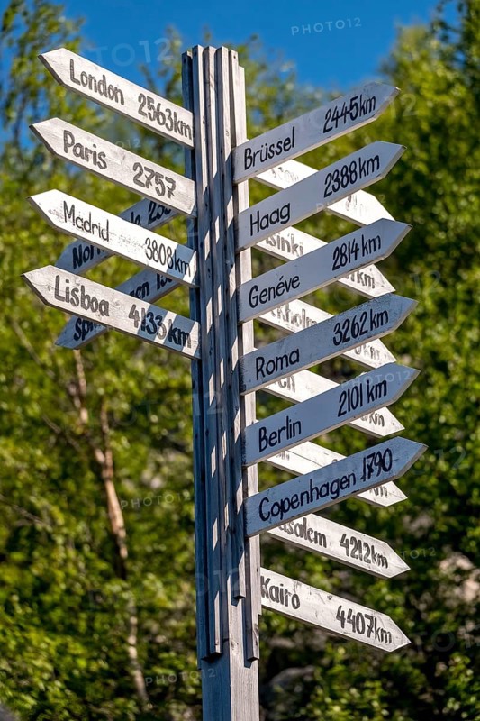 Norway-Russia border, signposts, distance to cities, Kirkenes, Finnmark, Norway, Scandinavia, Europe, adventure travel, tourism, border markers, Hurtigruten, Hurtigruten voyage, cruise, land border, NOR, travel, destination, sea voyage, sightseeing, national border, tourism, Norwegian, Scandinavian, touristic