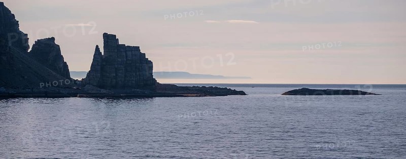 Finnkjerka rock formation, Kjøllefjord, Finnmark, Norway, Scandinavia, Europe, adventure trip, Finnkirka, fjord, tourism, backlight, Hurtigruten, Hurtigruten trip, Church of the Finns, Kjøllefjord, cliff, cruise, legends, NOR, natural monument, Sami sacrificial site, journey, destination, sea trip, sightseeing, tourism, Norwegian, Scandinavian, touristic