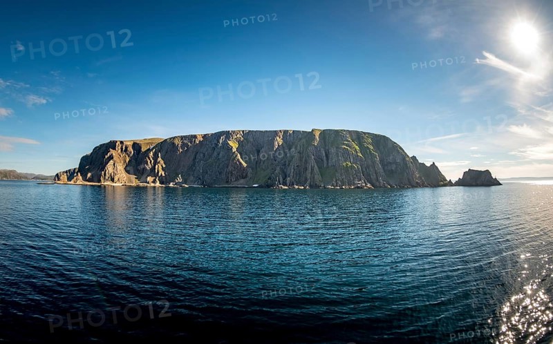 Finnkjerka rock formation, Kjøllefjord, Finnmark, Norway, Scandinavia, Europe, adventure trip, Finnkirka, fjord, tourism, Hurtigruten, Hurtigruten trip, Church of the Finns, Kjøllefjord, cliff, cruise, legends, NOR, natural monument, Sami sacrificial site, journey, destination, sea trip, sightseeing, tourism, Norwegian, Scandinavian, touristic