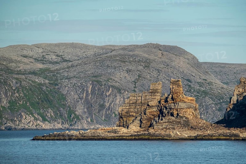 Finnkjerka rock formation, Kjøllefjord, Finnmark, Norway, Scandinavia, Europe, adventure trip, Finnkirka, fjord, tourism, Hurtigruten, Hurtigruten trip, Church of the Finns, Kjøllefjord, cliff, cruise, legends, NOR, natural monument, Sami sacrificial site, journey, destination, sea trip, sightseeing, tourism, Norwegian, Scandinavian, touristic