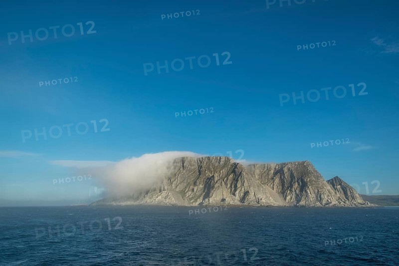 Island in the fog, Kjøllefjord, Finnmark, Norway, Scandinavia, Europe, adventure travel, tourism, Hurtigruten, Hurtigruten voyage, Kjøllefjord, cruise, NOR, fog, travel, destination, sea voyage, sightseeing, tourism, clouds, Norwegian, Scandinavian, touristic