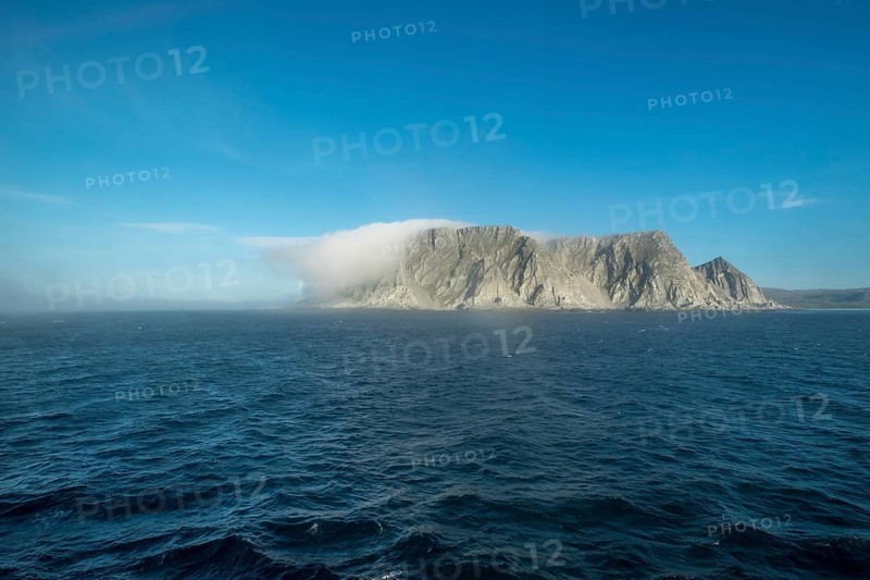 Island in the fog, Kjøllefjord, Finnmark, Norway, Scandinavia, Europe, adventure travel, tourism, Hurtigruten, Hurtigruten voyage, Kjøllefjord, cruise, NOR, fog, travel, destination, sea voyage, sightseeing, tourism, clouds, Norwegian, Scandinavian, touristic