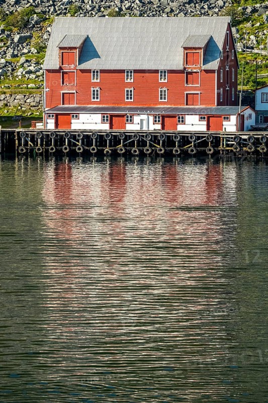 Foldalbruket kystkultursenter, museum, Norwegian house in red colours, jetty, Kjøllefjord, Finnmark, Norway, Scandinavia, Europe, adventure travel, fjord, Foldalbruket Coastal Cultural Centre, tourism, wooden house, Hurtigruten, Hurtigruten journey, Kjøllefjord, cruise, NOR, journey, destination, sea voyage, sightseeing, tourism, Norwegian, red facade, Scandinavian, tourist, white windows