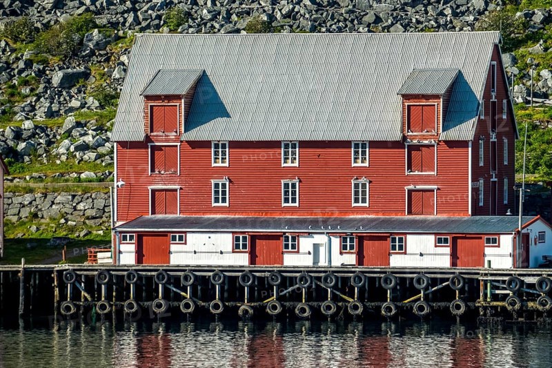 Foldalbruket kystkultursenter, museum, Norwegian house in red colours, jetty, Kjøllefjord, Finnmark, Norway, Scandinavia, Europe, adventure travel, fjord, Foldalbruket Coastal Cultural Centre, tourism, wooden house, Hurtigruten, Hurtigruten journey, Kjøllefjord, cruise, NOR, journey, destination, sea voyage, sightseeing, tourism, Norwegian, red facade, Scandinavian, tourist, white windows