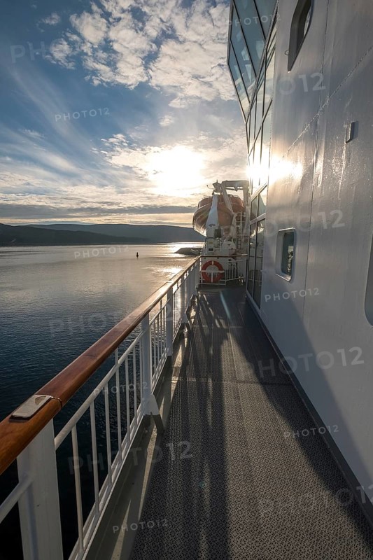 Ship railing in the evening light, Mehamn, Finnmark, Norway, Scandinavia, Europe, adventure travel, tourism, Hurtigruten, Hurtigruten voyage, cruise, cruise ship, NOR, journey, destination, railing, ship, ship MS Polarlys, shipping, sea voyage, sightseeing, tourism, Norwegian, Scandinavian, touristic