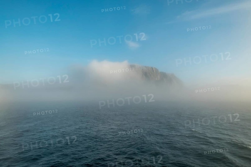 Island in the fog, Kjøllefjord, Finnmark, Norway, Scandinavia, Europe, adventure travel, tourism, Hurtigruten, Hurtigruten voyage, Kjøllefjord, cruise, NOR, fog, travel, destination, sea voyage, sightseeing, tourism, clouds, Norwegian, Scandinavian, touristic