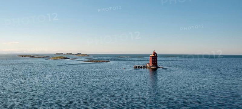Kjeungskjær Fyr, red lighthouse, off the Norwegian coast on a small archipelago off Ã˜rland, Trø¸ndelag.Uthaug, Trø¸ndelag, Norway, Scandinavia, Europe, adventure travel, monument protection, fjord, tourism, Hurtigruten, Hurtigruten voyage, island, cruise, coast, coastal landscape, lighthouse, NOR, travel, destination, skerry, sea voyage, seabird sanctuary, sightseeing, tourism, Trøndelag, tower, Uthaug, octagonal, Norwegian, red colour, red facade, Scandinavian, touristy, Red Lighthouse, wooden lighthouse, historic lighthouse, landmark, landmarking