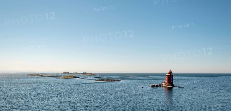 Kjeungskjær Fyr, red lighthouse, off the Norwegian coast on a small archipelago off Ã˜rland, Trø¸ndelag.Uthaug, Trø¸ndelag, Norway, Scandinavia, Europe, adventure travel, monument protection, fjord, tourism, Hurtigruten, Hurtigruten voyage, island, cruise, coast, coastal landscape, lighthouse, NOR, travel, destination, skerry, sea voyage, seabird sanctuary, sightseeing, tourism, Trøndelag, tower, Uthaug, octagonal, Norwegian, red colour, red facade, Scandinavian, touristy, Red Lighthouse, wooden lighthouse, historic lighthouse, landmark, landmarking