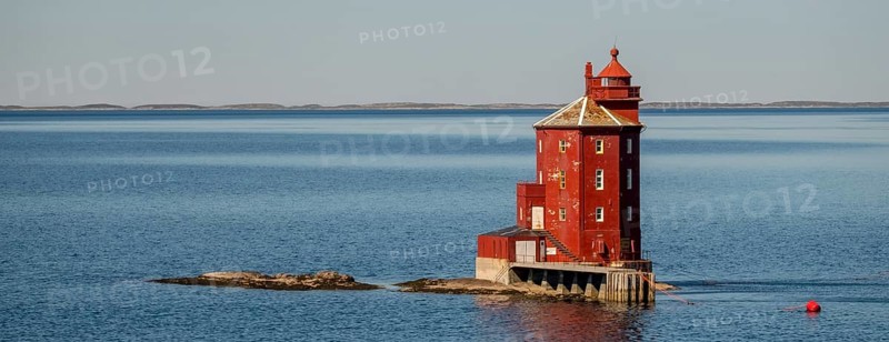 Kjeungskjær Fyr, red lighthouse, off the Norwegian coast on a small archipelago off Ã˜rland, Trø¸ndelag.Uthaug, Trø¸ndelag, Norway, Scandinavia, Europe, adventure travel, monument protection, fjord, tourism, Hurtigruten, Hurtigruten voyage, island, cruise, coast, coastal landscape, lighthouse, NOR, travel, destination, skerry, sea voyage, seabird sanctuary, sightseeing, tourism, Trøndelag, tower, Uthaug, octagonal, Norwegian, red colour, red facade, Scandinavian, touristy, Red Lighthouse, wooden lighthouse, historic lighthouse, landmark, landmarking