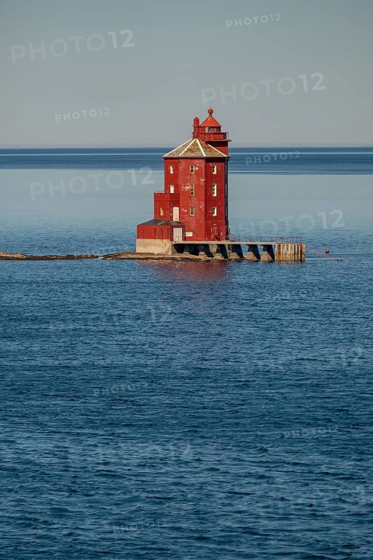 Kjeungskjær Fyr, red lighthouse, off the Norwegian coast on a small archipelago off Ã˜rland, Trø¸ndelag.Uthaug, Trø¸ndelag, Norway, Scandinavia, Europe, adventure travel, monument protection, fjord, tourism, Hurtigruten, Hurtigruten voyage, island, cruise, coast, coastal landscape, lighthouse, NOR, travel, destination, skerry, sea voyage, seabird sanctuary, sightseeing, tourism, Trøndelag, tower, Uthaug, octagonal, Norwegian, red colour, red facade, Scandinavian, touristy, Red Lighthouse, wooden lighthouse, historic lighthouse, landmark, landmarking
