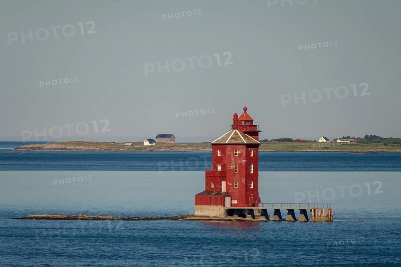 Kjeungskjær Fyr, red lighthouse, off the Norwegian coast on a small archipelago off Ã˜rland, Trø¸ndelag.Uthaug, Trø¸ndelag, Norway, Scandinavia, Europe, adventure travel, monument protection, fjord, tourism, Hurtigruten, Hurtigruten voyage, island, cruise, coast, coastal landscape, lighthouse, NOR, travel, destination, skerry, sea voyage, seabird sanctuary, sightseeing, tourism, Trøndelag, tower, Uthaug, octagonal, Norwegian, red colour, red facade, Scandinavian, touristy, Red Lighthouse, wooden lighthouse, historic lighthouse, landmark, landmarking