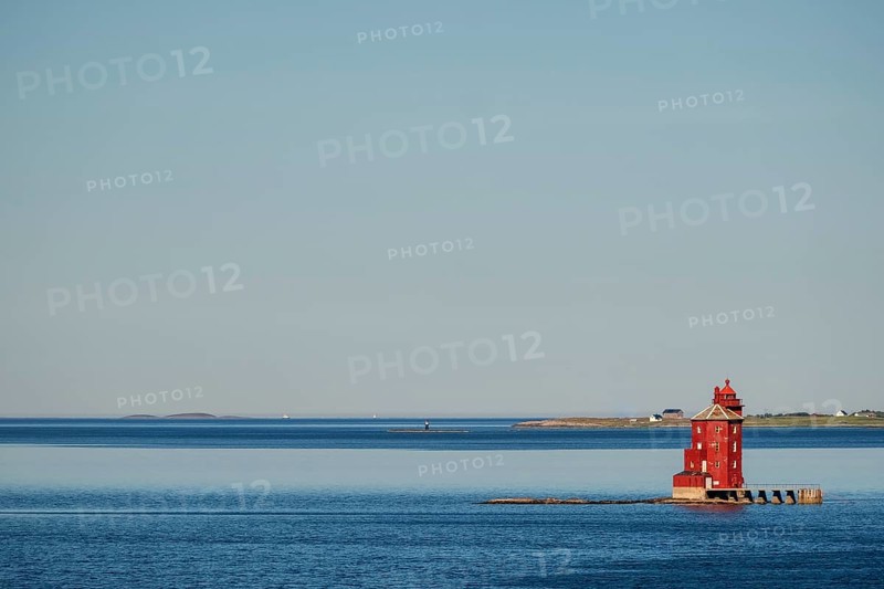 Kjeungskjær Fyr, red lighthouse, off the Norwegian coast on a small archipelago off Ã˜rland, Trø¸ndelag.Uthaug, Trø¸ndelag, Norway, Scandinavia, Europe, adventure travel, monument protection, fjord, tourism, Hurtigruten, Hurtigruten voyage, island, cruise, coast, coastal landscape, lighthouse, NOR, travel, destination, skerry, sea voyage, seabird sanctuary, sightseeing, tourism, Trøndelag, tower, Uthaug, octagonal, Norwegian, red colour, red facade, Scandinavian, touristy, Red Lighthouse, wooden lighthouse, historic lighthouse, landmark, landmarking