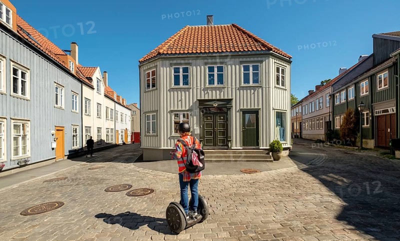 Residential buildings in the city centre, Nedre Bakklandet corner Nygata Street, Trondheim, Trøndelag, Norway, Scandinavia, Europe, adventure travel, tourism, Hurtigruten, Hurtigruten voyage, cruise, NOR, travel, destination, sea voyage, sightseeing, tourism, Trøndelag, historic street, historic residential buildings, Norwegian, Scandinavian, touristic