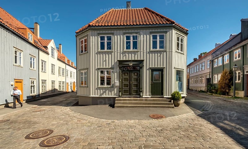 Residential buildings in the city centre, Nedre Bakklandet corner Nygata Street, Trondheim, Trøndelag, Norway, Scandinavia, Europe, adventure travel, tourism, Hurtigruten, Hurtigruten voyage, cruise, NOR, travel, destination, sea voyage, sightseeing, tourism, Trøndelag, historic street, historic residential buildings, Norwegian, Scandinavian, touristic