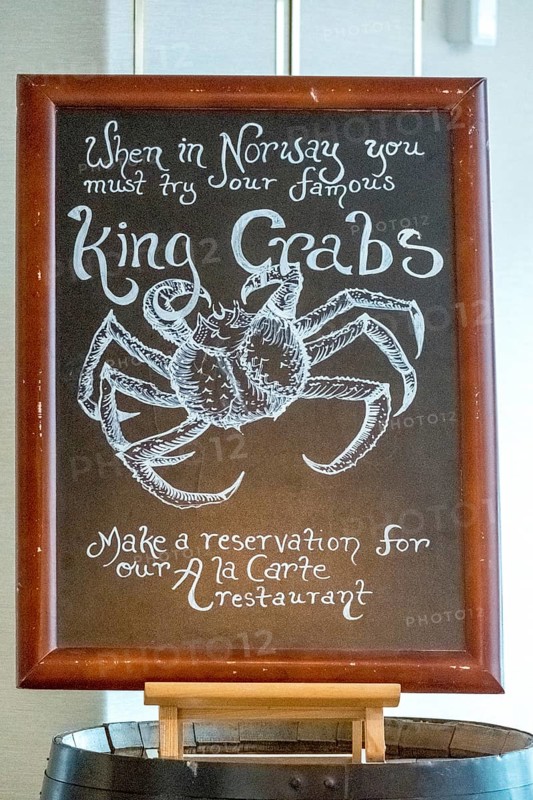 Dining plan, advertising poster for king crabs, Molde, Møre og Romsdal, Norway, Scandinavia, Europe, adventure travel, food and drink, tourism, inn, gastronomy, Hurtigruten, Hurtigruten voyage, crabs, cruise, Møre og Romsdal, NOR, travel, destination, reservation, restaurant, sea voyage, sightseeing, tourism, advertising, Norwegian, Scandinavian, touristic