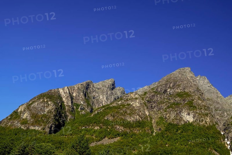 Trollstigen Camping, Innfjorden, Møre og Romsdal, Norway, Scandinavia, Europe, adventure travel, mountains, ridge, camping, camping site, campsite, cliffs, leisure, tourism, mountain, mountain range, mountain landscape, mountain range, Hurtigruten, Hurtigruten voyage, cruise, Møre og Romsdal, NOR, travel, destination, sea voyage, sightseeing, tourism, Norwegian, Scandinavian, tourist, mountain in the shape of an Indian