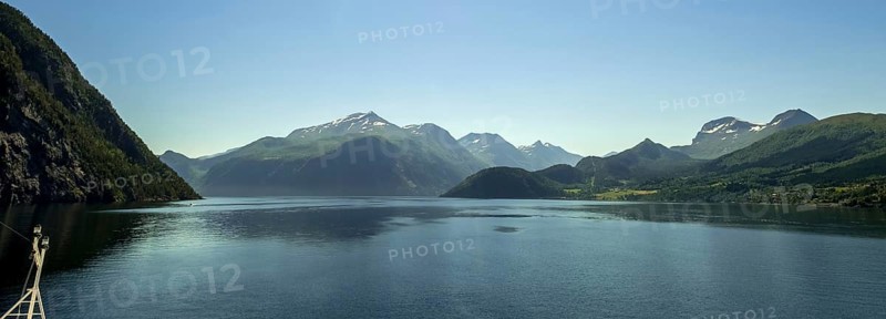 Panoramic view, fjord and mountain formations, Storfjord, Stranda, Møre og Romsdal, Norway, Scandinavia, Europe, adventure trip, mountains, fjord, tourism, Hurtigruten, Hurtigruten trip, cruise, Møre og Romsdal, NOR, nature, panoramic view, panoramic photo, travel, destination, ship bow, sea trip, sightseeing, tourism, blue sea, Norwegian, Scandinavian, touristic
