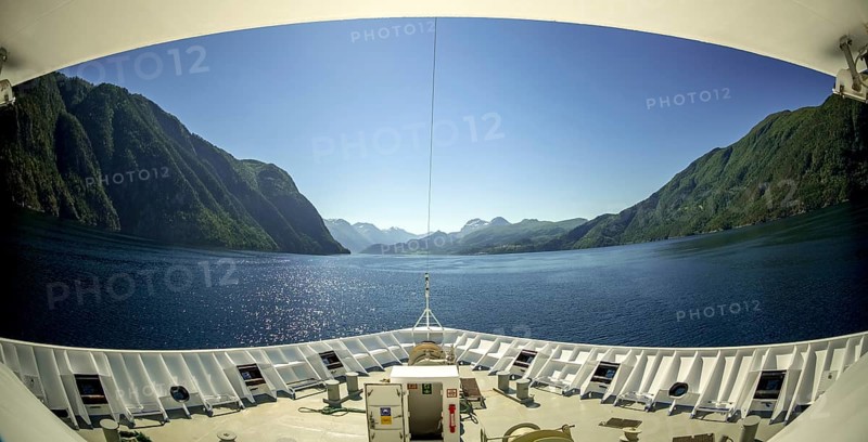 Panoramic view, bow, Storfjord, Stranda, Møre og Romsdal, Norway, Scandinavia, Europe, adventure trip, view, mountains, mountainside, fjord, tourism, mountains, mountain range, mountain landscape, mountain range, Hurtigruten, Hurtigruten voyage, cruise, Møre og Romsdal, NOR, panoramic view, panoramic photo, travel, destination, ship's bow, sea voyage, sightseeing, Stordal, tourism, blue sea, Norwegian, Scandinavian, touristic